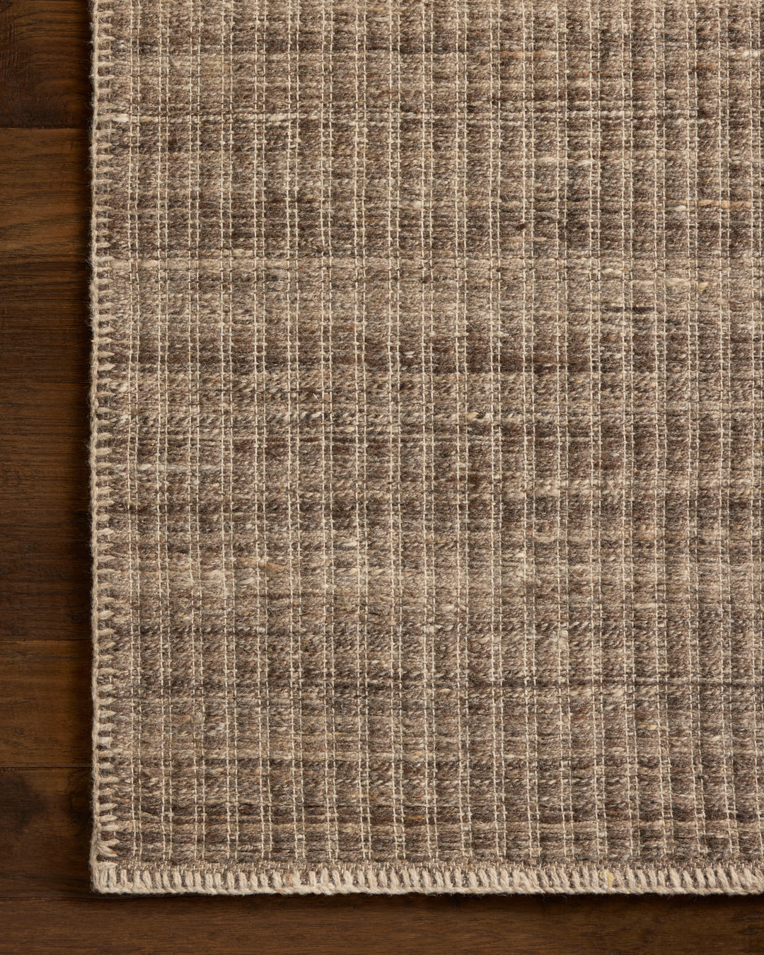 Textured Elm Bark coloured area rug on a wooden floor