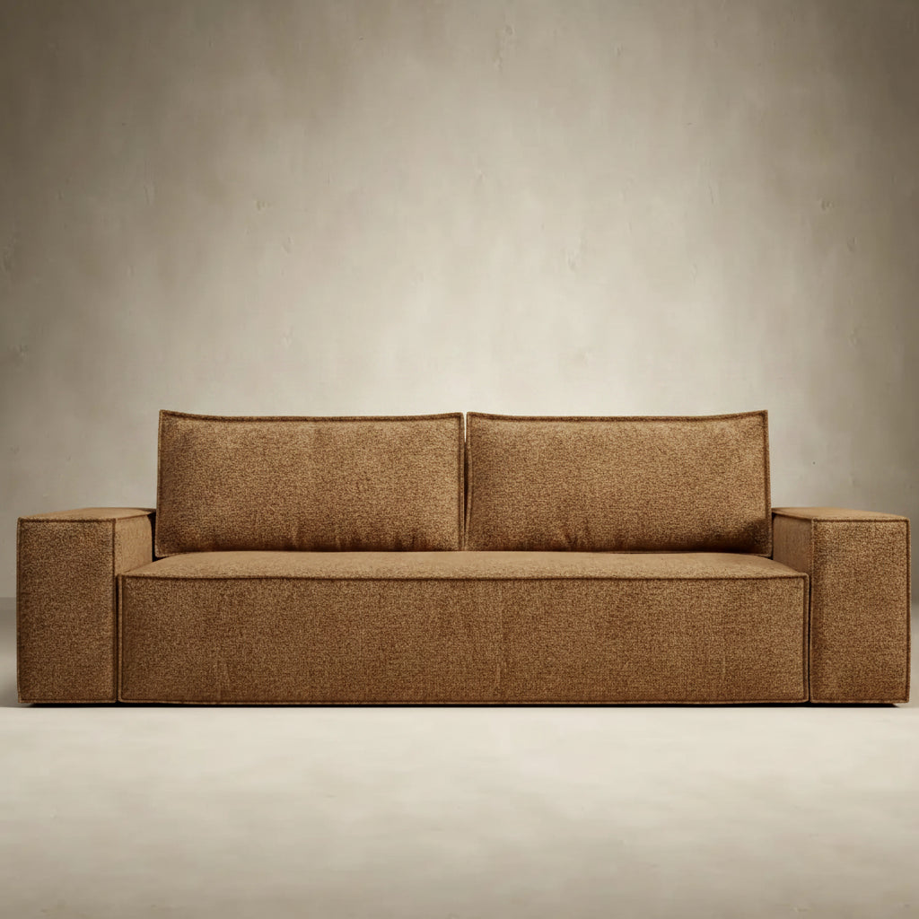 Play sofa bed with wide arms in cream fabric. Shown with one wooden arm tray